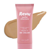 A pink tube of RAWW Vitamin C BB Cream 30ml stands before a beige swipe, showcasing the hydrating formula with wildberry harvest, chia seed, and argan oil for a radiant complexion and creamy texture.