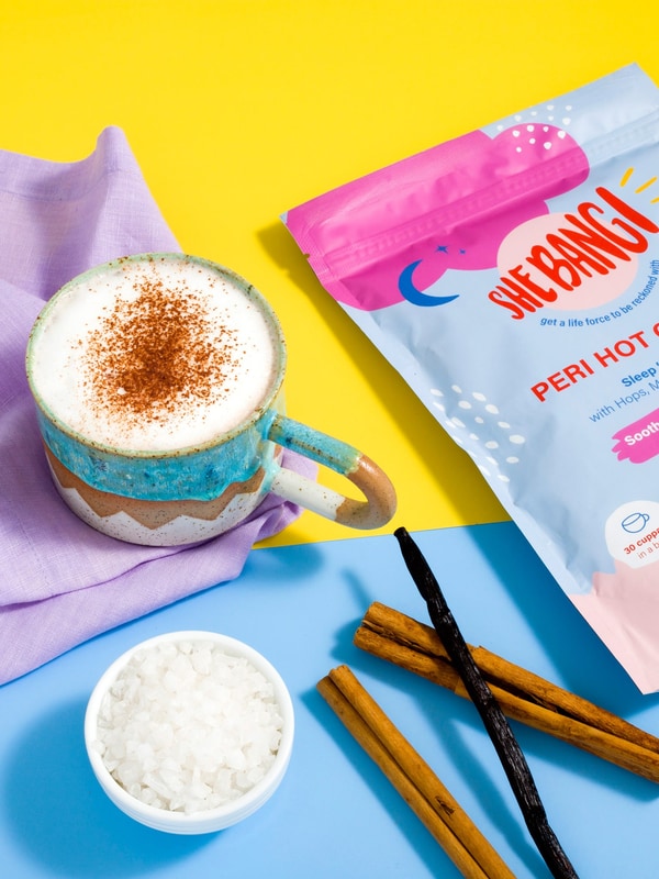 She BANG! Peri Hot Choccy pouch with a prepared chocolate drink and ingredients