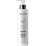 Madara Cleansing Milk 200ml comes in a white pump bottle with green botanical graphics. This gentle, sulfate-free cleanser removes makeup, soothes skin, and is ideal for sensitive and all skin types.