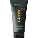 The Madara Grow Volume Conditioner 175ml is a black tube with yellow and white text, ideal for fine or thinning hair. Featuring chanterelle fungi, this silicone-free conditioner comes in plant-based packaging and stands upright on a white background.