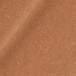 A close-up of shimmery light brown fabric with a glittery texture, evoking the radiant finish of Madara H2O Tint Hyaluron Tinted Serum 30ml. "Wild Flower" is written at the bottom in white text.