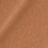 A close-up of shimmery light brown fabric with a glittery texture, evoking the radiant finish of Madara H2O Tint Hyaluron Tinted Serum 30ml. "Wild Flower" is written at the bottom in white text.
