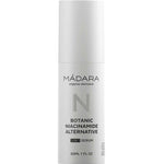 The Madara Niacinamide Alternative 5-in-1 Serum 30ml comes in a sleek white cylindrical bottle with minimalist black and gray text—ideal for breakout-prone skin seeking a gentle niacinamide alternative.