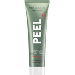 A green tube labeled Madara Peel Creamy Clay 7% AHA Clay Mask 60ml, an exfoliating and pore-refining peel mask, sits against a white background.