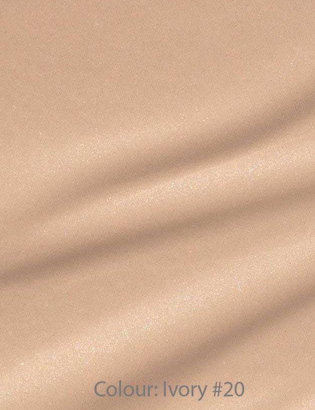 Madara Skin Equal Soft Glow Foundation SPF15 30ml in shade Ivory #20 offers a smooth, lightly shimmery finish in light beige with subtle horizontal texture, evoking the look of dewy, radiant skin.
