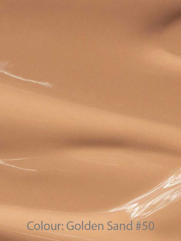 A smooth, glossy surface in a warm golden sand shade—like a dewy finish foundation. Text at the bottom reads: Madara Skin Equal Soft Glow Foundation SPF15 30ml, Colour: Golden Sand #50.