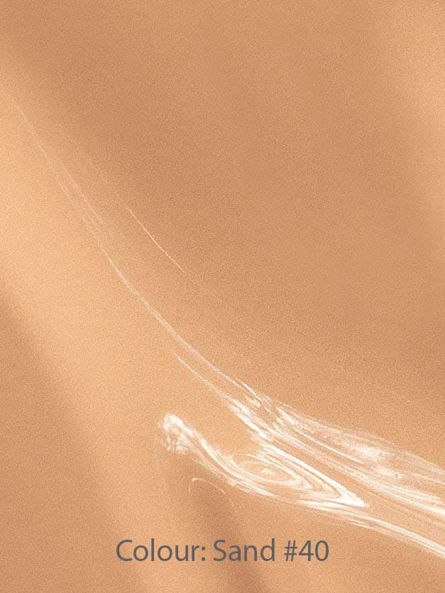 Madara Skin Equal Soft Glow Foundation SPF15 30ml features a smooth, glossy surface in soft Sand #40 with subtle light reflections, evoking a dewy finish. The text Colour: Sand #40 is displayed at the bottom.