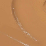 Close-up of Madara Skin Equal Soft Glow Foundation SPF15 30ml in a creamy warm olive shade with visible brush strokes. Text at the bottom reads: Colour: Olive #60.