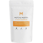 A white resealable pouch of Matcha Maiden Fly Me To The Immune Blend 28.35g with orange accents and icons for vegan, gluten-free, and dairy-free features an immune-boosting matcha green tea to refresh, renew, and rejuvenate.