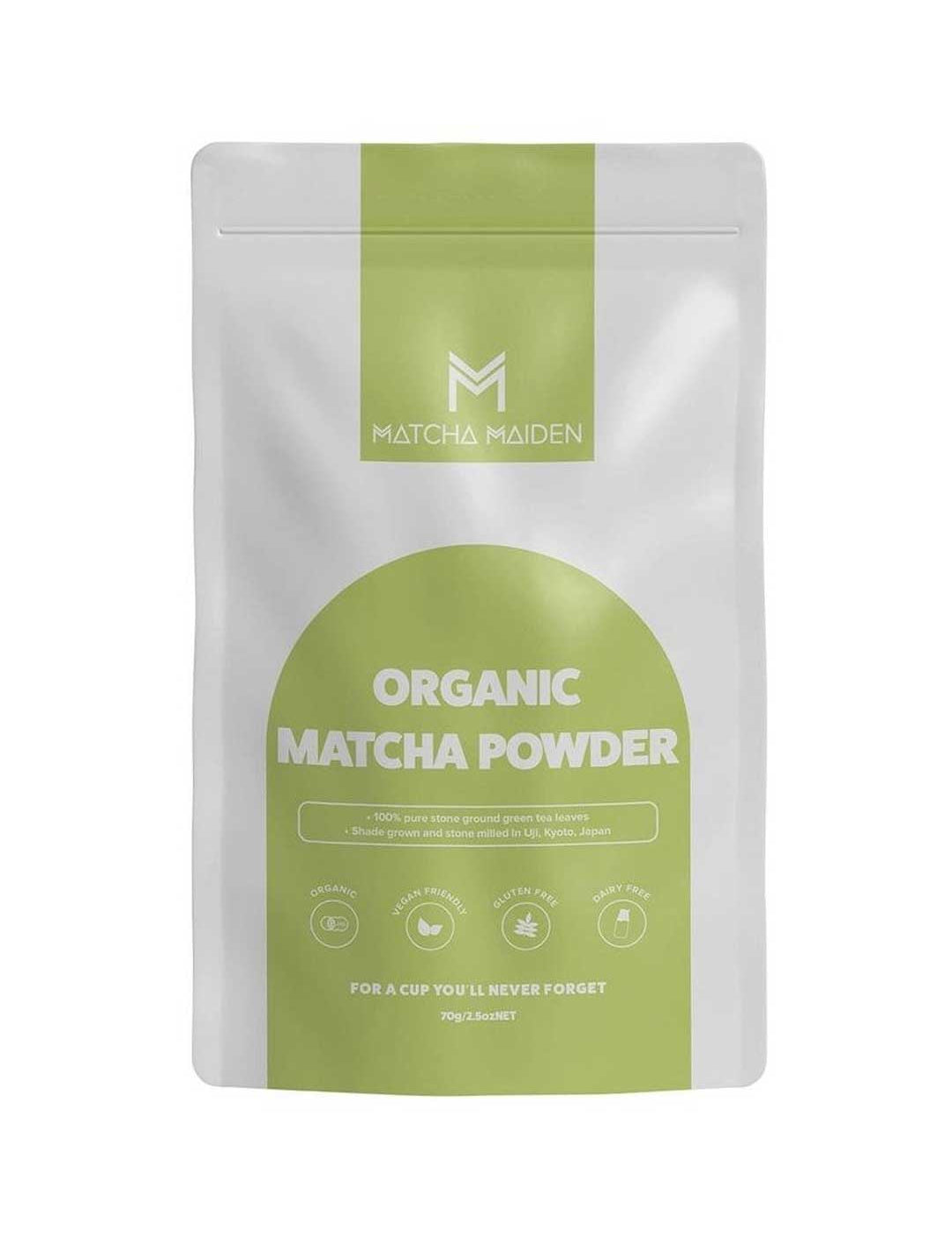 A white and green resealable pouch labeled Matcha Maiden Matcha Green Tea Powder 100% Pure Stone Ground 70g features icons and text highlighting its pure Japanese matcha quality, with "For a cup you'll never forget" at the bottom.