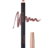 A mauve-hued INIKA Organic Lip Crayons 6.7g with the cap off displays its tip and a swatch of the shade beside it, featuring the text INIKA Organic and Lip Crayon on the pencil.