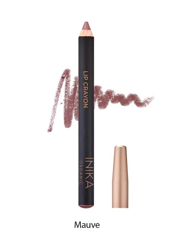 A mauve-hued INIKA Organic Lip Crayons 6.7g with the cap off displays its tip and a swatch of the shade beside it, featuring the text INIKA Organic and Lip Crayon on the pencil.