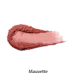 A swipe of mauve-pink 100% Pure Fruit Pigmented® Blush 9g vegan powder is spread on a white background, with "Mauvette" written in black below the swatch.