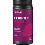 A dark plastic container of Melrose Essential Reds 120g, a berry powder with a purple label and white text, marketed as a skin health supplement and antioxidant superfood blend, highlighting its skin-loving antioxidant benefits.