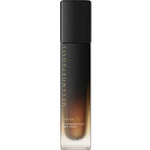 A sleek black-to-amber ombre bottle of Metamorphosis Awaken Hyaluronic Acid Prep Spritz 100ml by Vanessa Megan, designed to hydrate perimenopausal skin, stands upright against a white background.