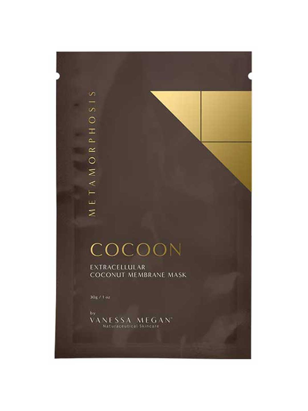 A brown packet labeled Metamorphosis Cocoon Extracellular Coconut Membrane Mask 3-Pack by Vanessa Megan, with gold accents and a minimalist design—ideal for mature skin seeking amino acid benefits.