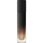 A sleek black and gold ombre 100ml bottle labeled Metamorphosis Cool & Calm Hot Flush Cooling & Relaxing Mist features essential oils for soothing hormonal support.