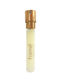 A clear 10ml glass bottle of Metamorphosis Formë Aromatherapeutic Perfume Refill with a gold cap, filled with light yellow liquid. The alcohol-free fragrance is labeled "Formë" and shown against a white background.