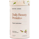 Mister Jones Daily Beauty Protein+ Organic Vanilla Bean 900g is a family-friendly, plant-based protein powder for gut health, in a cylindrical container with vanilla flower and pod illustrations on a light background.