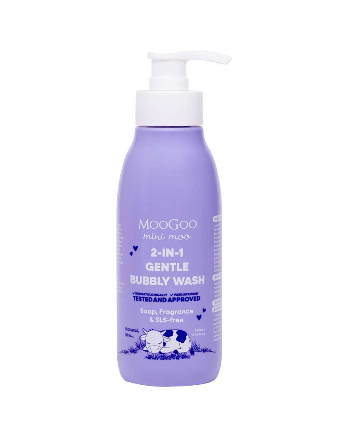 A 500ml bottle of MooGoo 2-in-1 Mini Moo Bubbly Wash with pump, gentle and natural for sensitive skin, in purple packaging with white and blue text and a cartoon cow at the bottom.