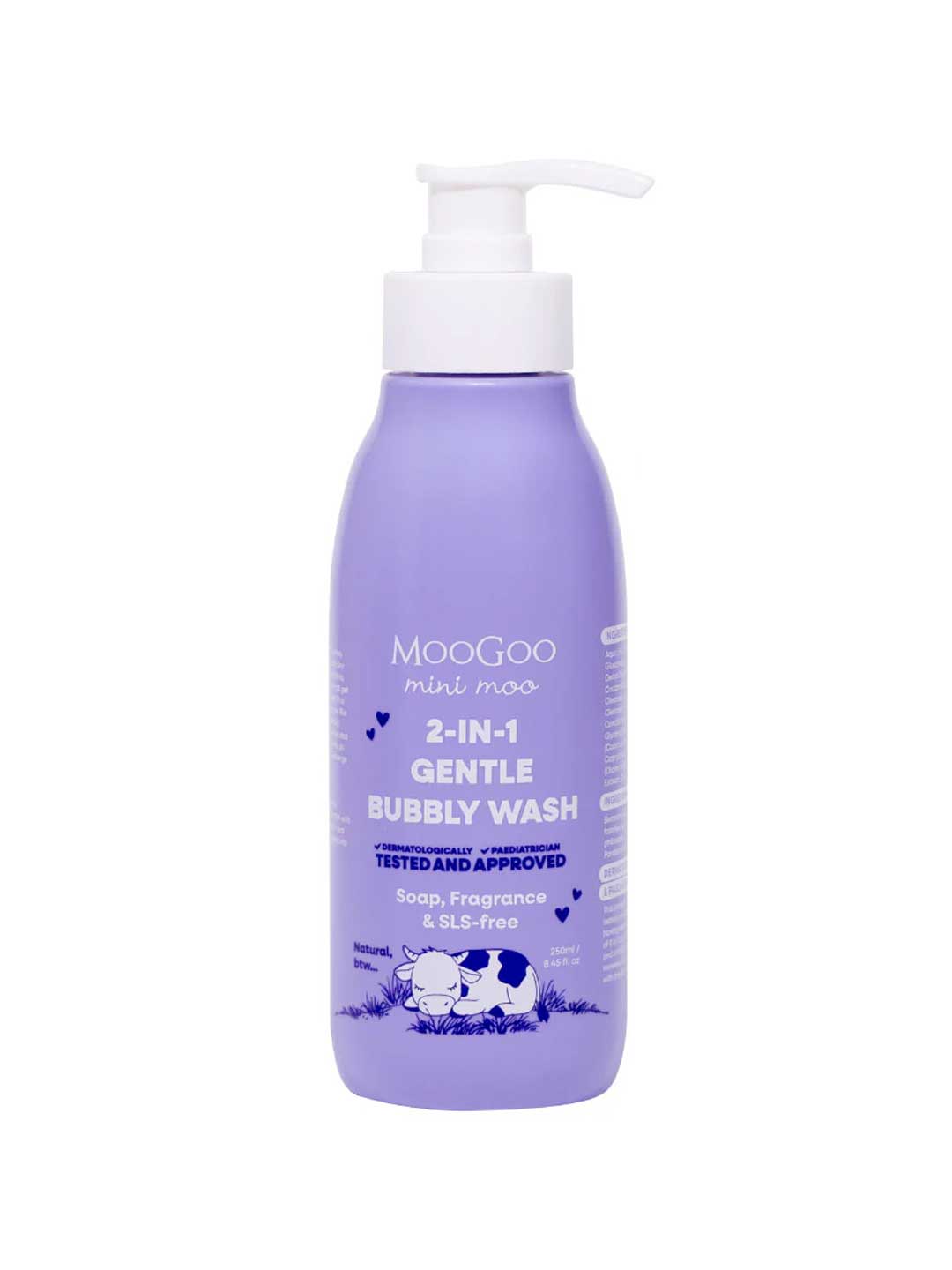 A 500ml bottle of MooGoo 2-in-1 Mini Moo Bubbly Wash with pump, gentle and natural for sensitive skin, in purple packaging with white and blue text and a cartoon cow at the bottom.