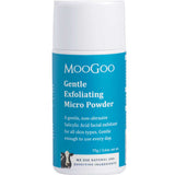 A cylindrical 75g container of MooGoo Gentle Exfoliating Micro Powder features a white cap, blue label with product details, and a small cow graphic near the base. This facial exfoliant by MooGoo is designed for sensitive skin.
