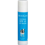 A white tube of MooGoo Natural SPF15 Lip Balm 5g with a blue label featuring a cow illustration, product details in white text, and formulated with Zinc Oxide for natural protection.