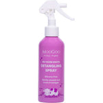 A pink 150ml bottle of MooGoo Mini Moo Natural Detangling Spray, a kid-friendly hair product with a white spray nozzle, featuring a cartoon cow and highlighting its silicone-free formula for smoothing knots and tangles.