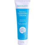 A 120g tube of MooGoo Natural Tanning Cream with a blue and white label, offering a moisturizing, buildable tan and fast results, made with healthy ingredients plus Hyaluronic Acid for extra hydration.