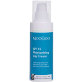 A white 75g bottle of MooGoo SPF 15 Moisturising Day Cream with a blue label and pump dispenser, offering hydrating zinc oxide sun protection against 94% of UV rays.