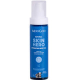 Blue bottle of Moogoo Skin Hero Hydrating Body Oil on a white background