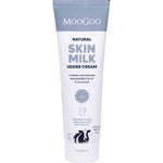 A tube of MooGoo Skin Milk Udder Cream, a sensitive skin moisturiser with blue and white packaging, hydrating and restoring benefits listed on the label, and a cow illustration near the base.
