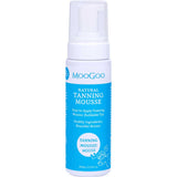 MooGoo Tanning Mousse 100ml comes in a blue and white bottle with a pump dispenser, perfect for sensitive skin. This gentle mousse delivers a natural-looking fake tan, with details displayed in white text on the label.