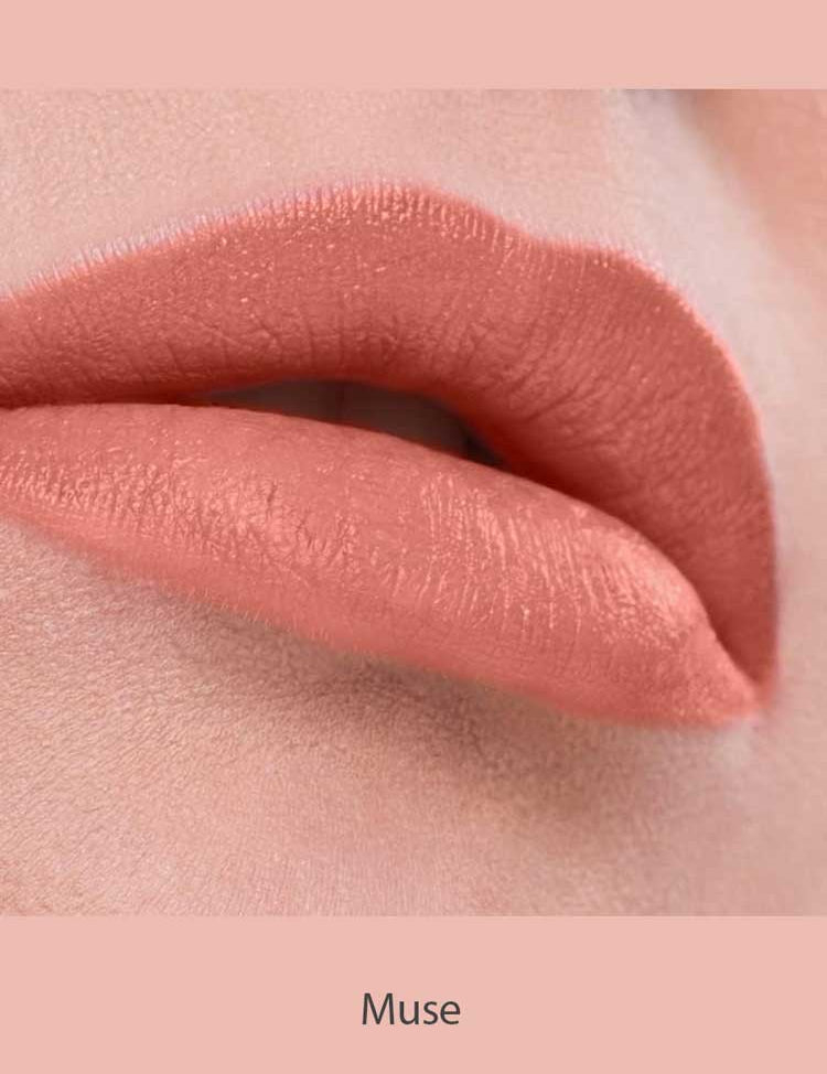 Close-up of lips wearing Benecos MAT Lipsticks 4.5 in mauve-pink, featuring a smooth, even matte finish. "Muse" appears below on a matching pink background.