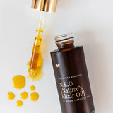 Dropper and oil of Vanessa Megan NEO 12 Hour Miracle Oil