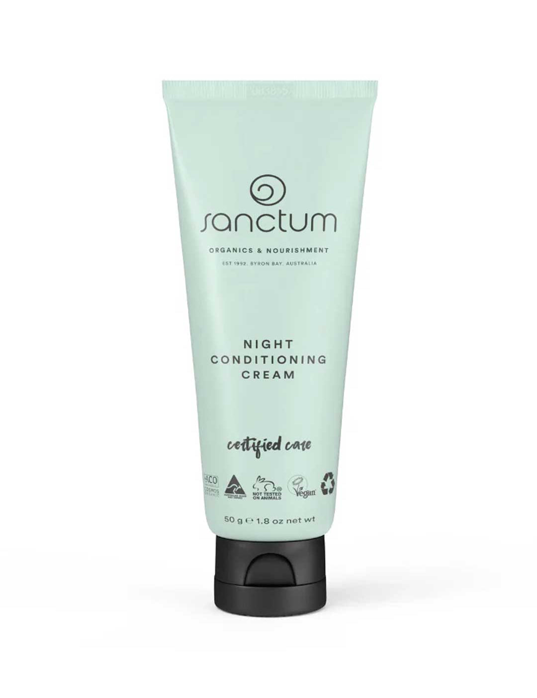 A mint green 50g (1.8 oz) tube of Sanctum Night Conditioning Cream features black text and symbols for organic skincare, vegan, cruelty-free, certified, and recyclable.