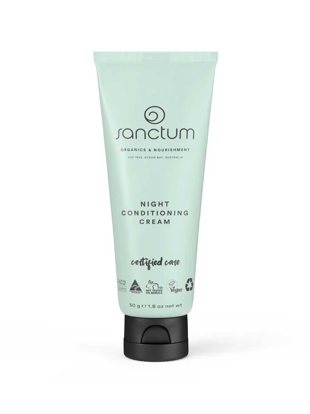 A mint green 50g (1.8 oz) tube of Sanctum Night Conditioning Cream features black text and symbols for organic skincare, vegan, cruelty-free, certified, and recyclable.