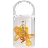 A clear plastic case with a curved handle holds two yellow Natural Rubber Soother Twin Pack Large Rounded 6 mths+ pacifiers. The label reads "natural rubber soother.