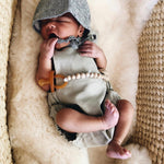 Baby with a Natural Rubber Soother Rounded
