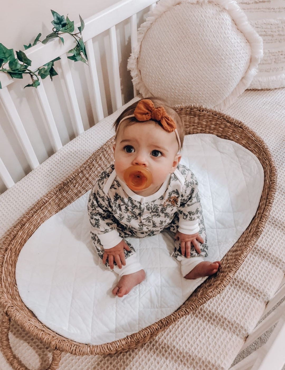 Baby using a Natural Rubber Soother Rounded