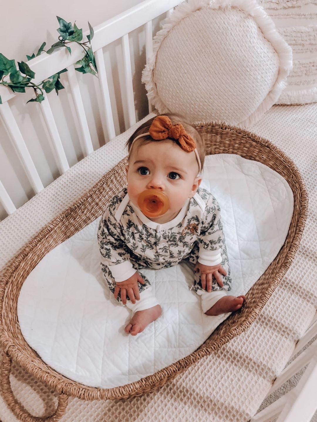 Baby using a Natural Rubber Soother Rounded