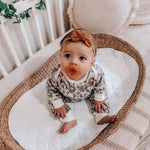 Baby using a Natural Rubber Soother Rounded