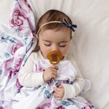 Sleeping baby using a Natural Rubber Soother Orthodontic