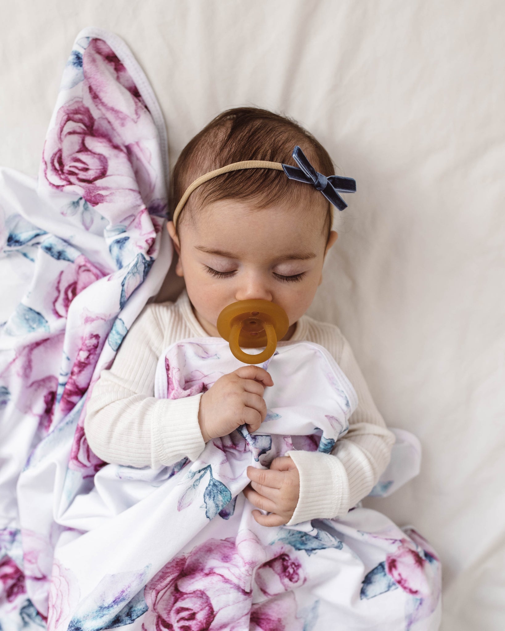Sleeping baby using a Natural Rubber Soother Orthodontic