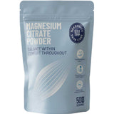 A silver stand-up pouch of Necessity Skin Care Magnesium Citrate Powder, featuring white and dark blue text and graphics on a clean white background.