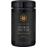 A black container labeled Superfeast Neural Nectar Nootropic Brain Tonic 100g features a gold logo. The label highlights cognitive function and describes it as a tonic herb blend.