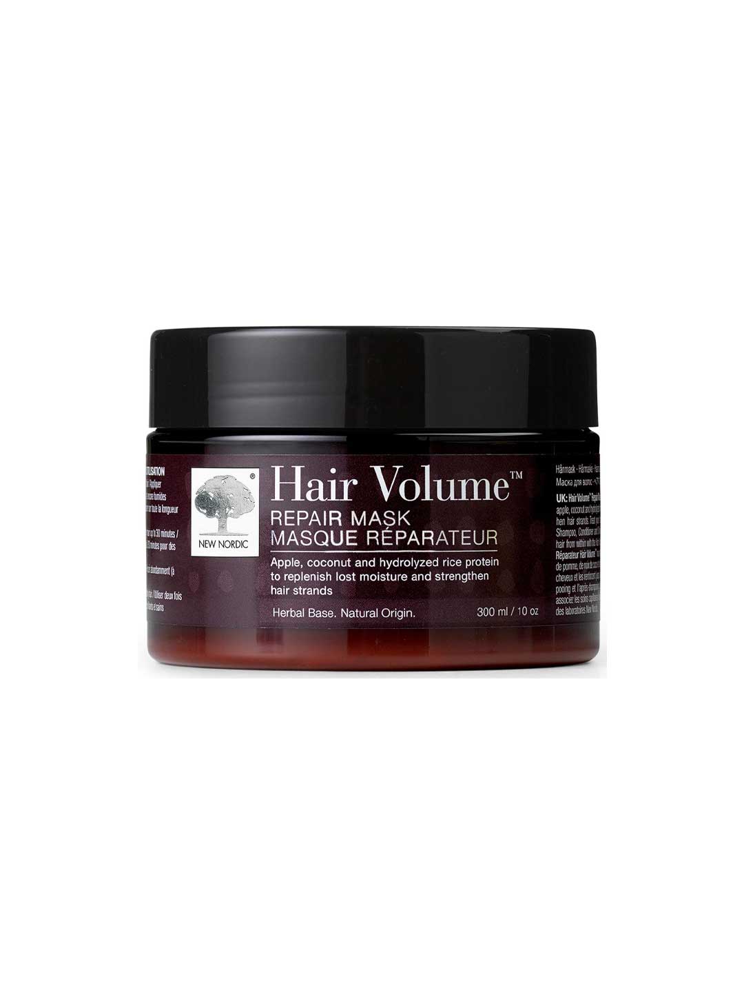 A 300ml brown jar of New Nordic Hair Volume Hair Mask, a vegan, sulfate-free formula with herbal and natural origin ingredients to restore moisture and strengthen hair.