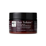 A 300ml brown jar of New Nordic Hair Volume Hair Mask, a vegan, sulfate-free formula with herbal and natural origin ingredients to restore moisture and strengthen hair.