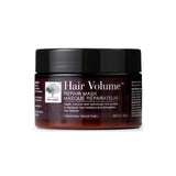 A 300ml brown jar of New Nordic Hair Volume Hair Mask, a vegan, sulfate-free formula with herbal and natural origin ingredients to restore moisture and strengthen hair.