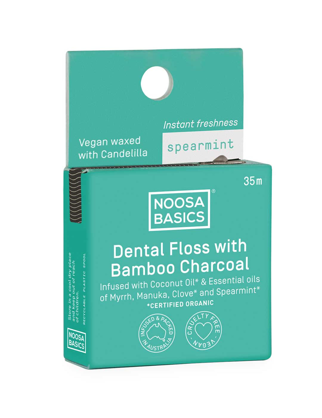 Noosa Basics dental floss packaging with bamboo charcoal and Spearmint on a white background